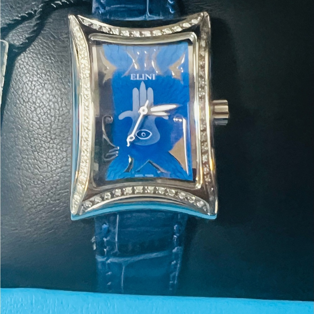 Elini Nazar Blue Lucky Hand Hamsa Steel
Diamond Quartz Watch on
Leather Strap💙 - Picture 13 of 16